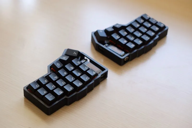 the Corne Keyboard with GMK White on Black Katakana Keycaps