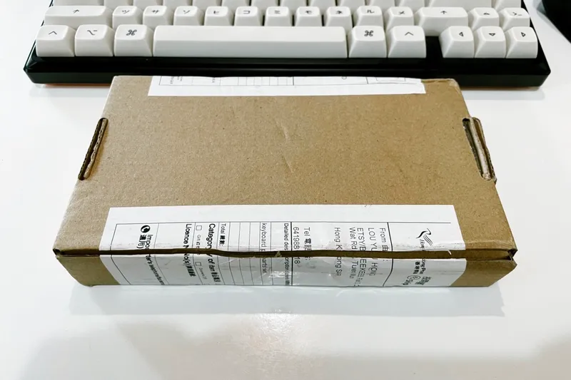 Corne keyboard parts delivered in a small box